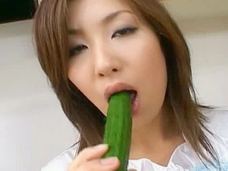 Japanese horny mom Saku enjoys XXX sex with big veggies